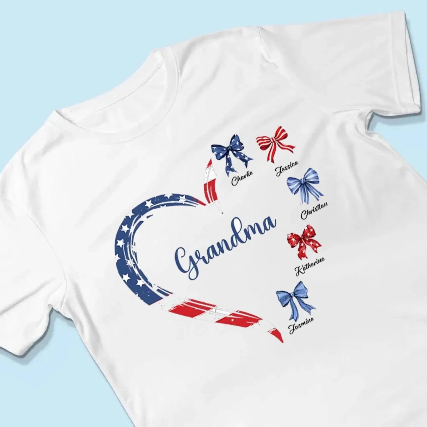 Proud American Grandma Shirt – Personalized Heart Bow T-Shirt with Grandkids' Names – 4th of July Gift for Mom, Nana, Mimi Ezcustomize