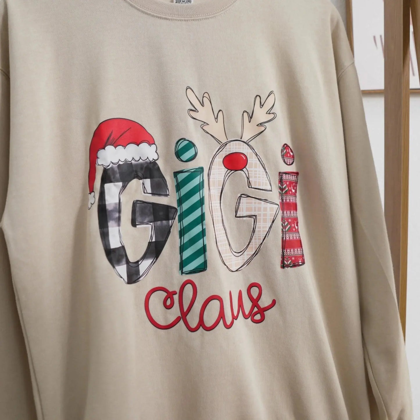 Custom Christmas Gigi Claus Sweatshirt, 2025 Christmas Nana Sweatshirt, Custom Grandma Claus Christmas Sweatshirt  Ezcustomize