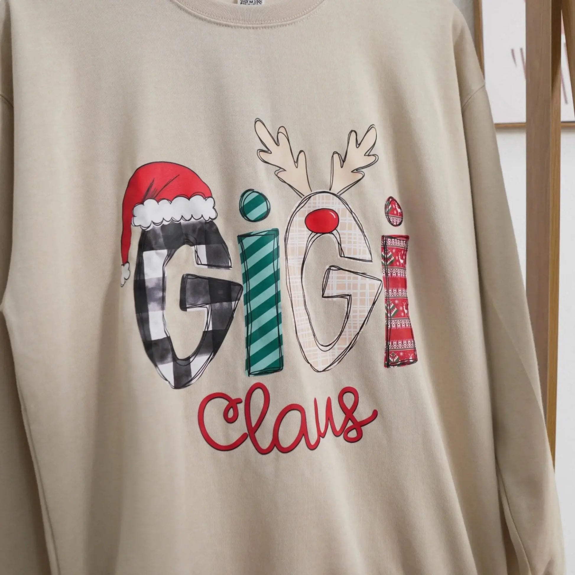 Custom Christmas Gigi Claus Sweatshirt, 2025 Christmas Nana Sweatshirt, Custom Grandma Claus Christmas Sweatshirt  Ezcustomize