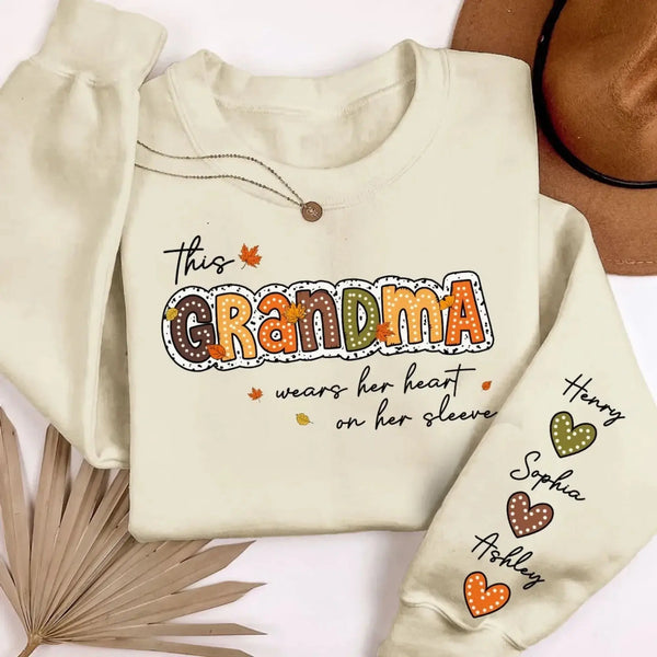 This Grandma Wears Her Heart on Her Sleeve – Personalized Sleeve Print Sweatshirt – Fall Season Gift for Grandma/Mama